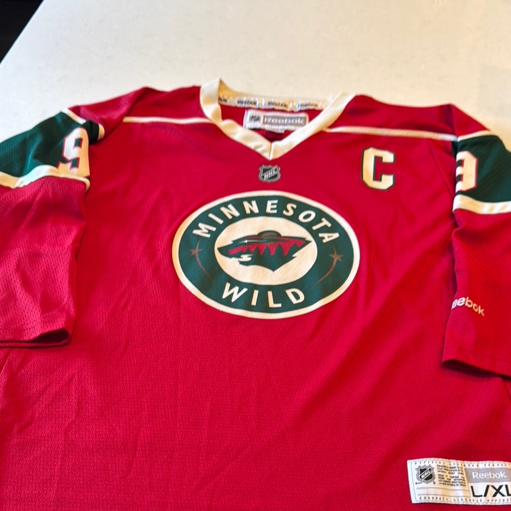 Reebok youth XL Minnesota Wild Hockey Jersey size? women’s? See measurements.